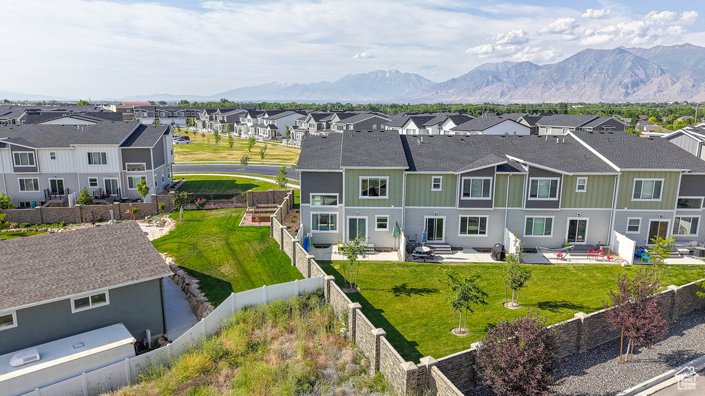 Aerial view of residential area with mountains