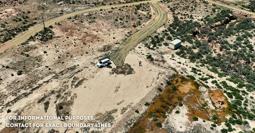 Aerial view of property and surrounding area featuring rural landscape
