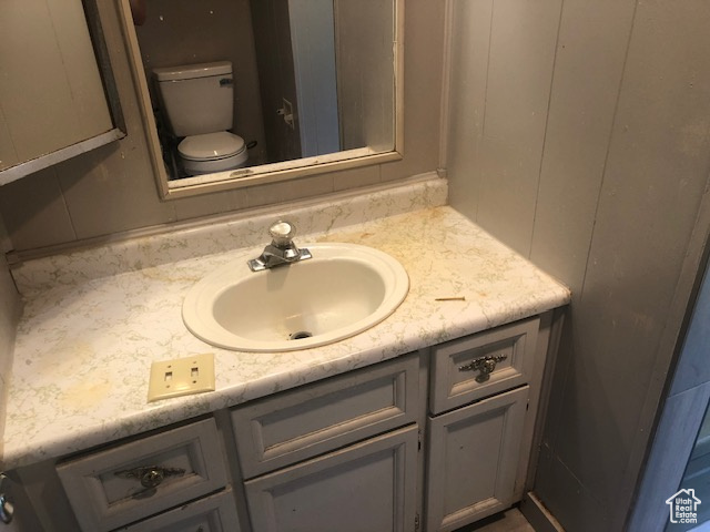 Half bath with toilet and vanity