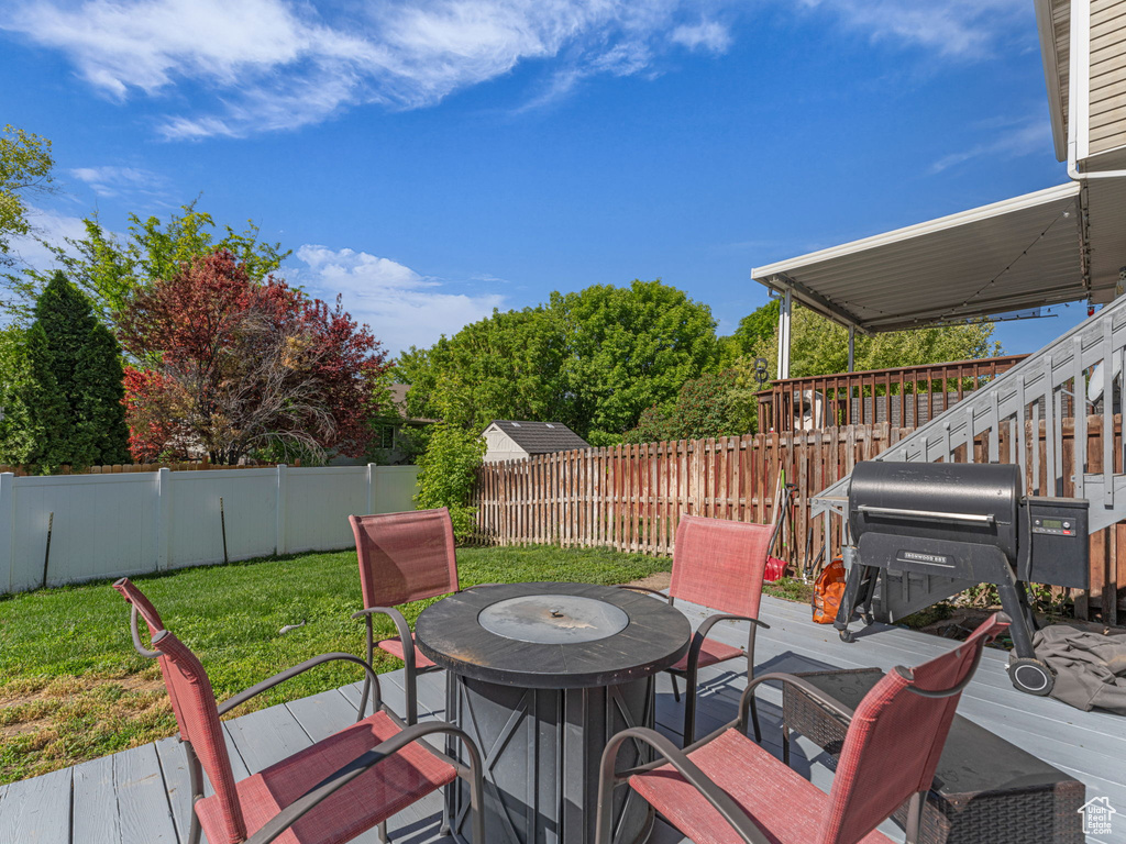 Wooden deck with outdoor dining space