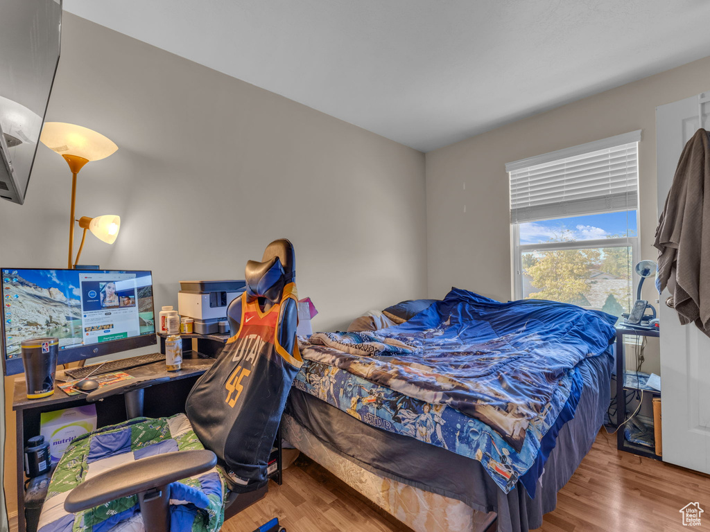 Bedroom featuring wood finished floors