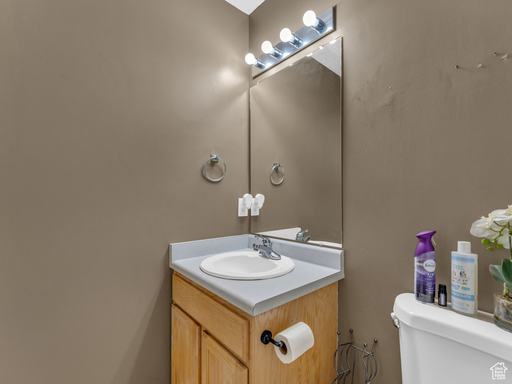 Bathroom with toilet and vanity