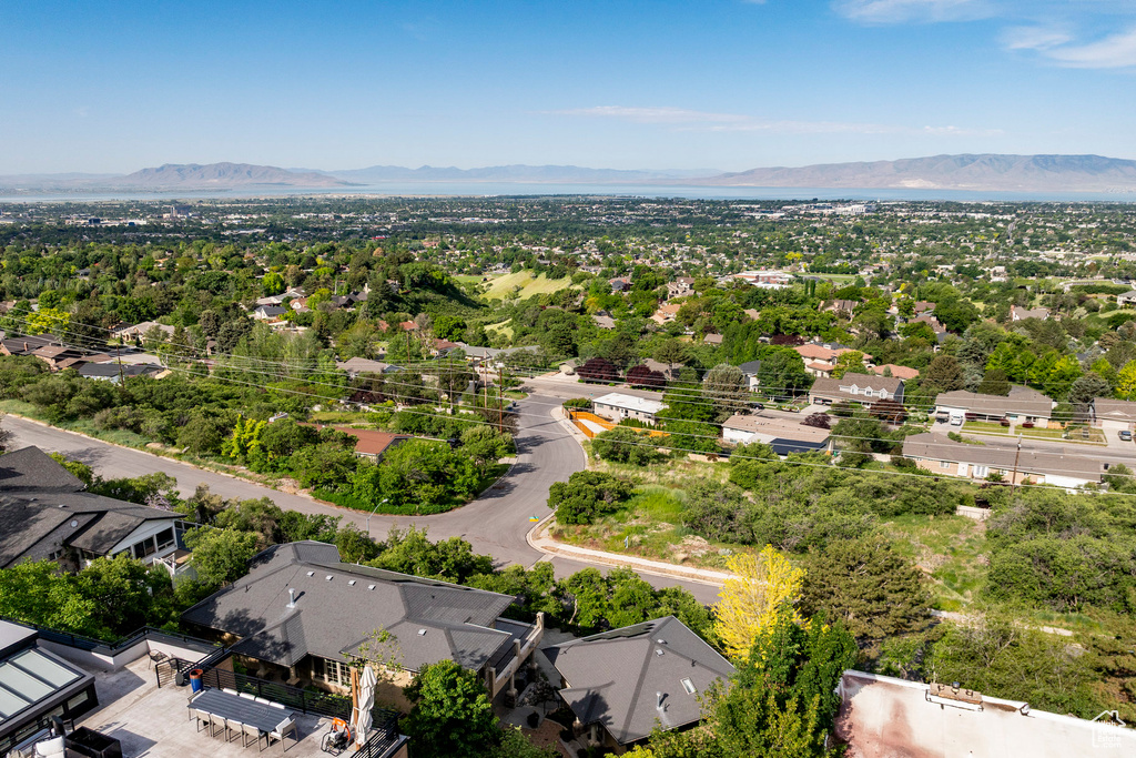 Aerial view of residential area with a mountain backdrop