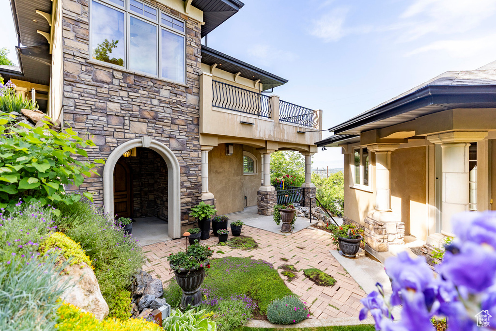 View of patio / terrace with a balcony