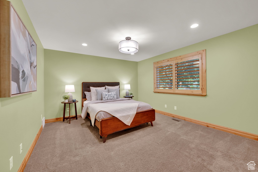 Bedroom with baseboards, carpet, and recessed lighting