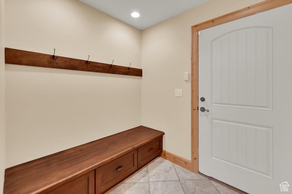 Mudroom featuring recessed lighting and baseboards