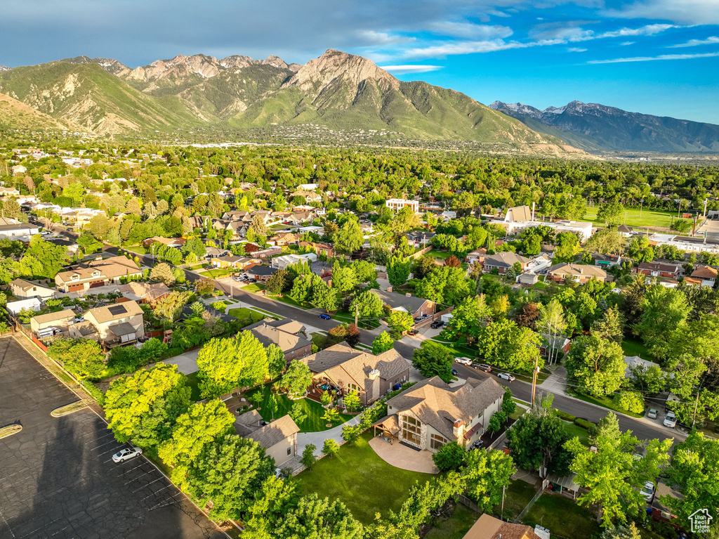 Aerial view of residential area with a mountainous background