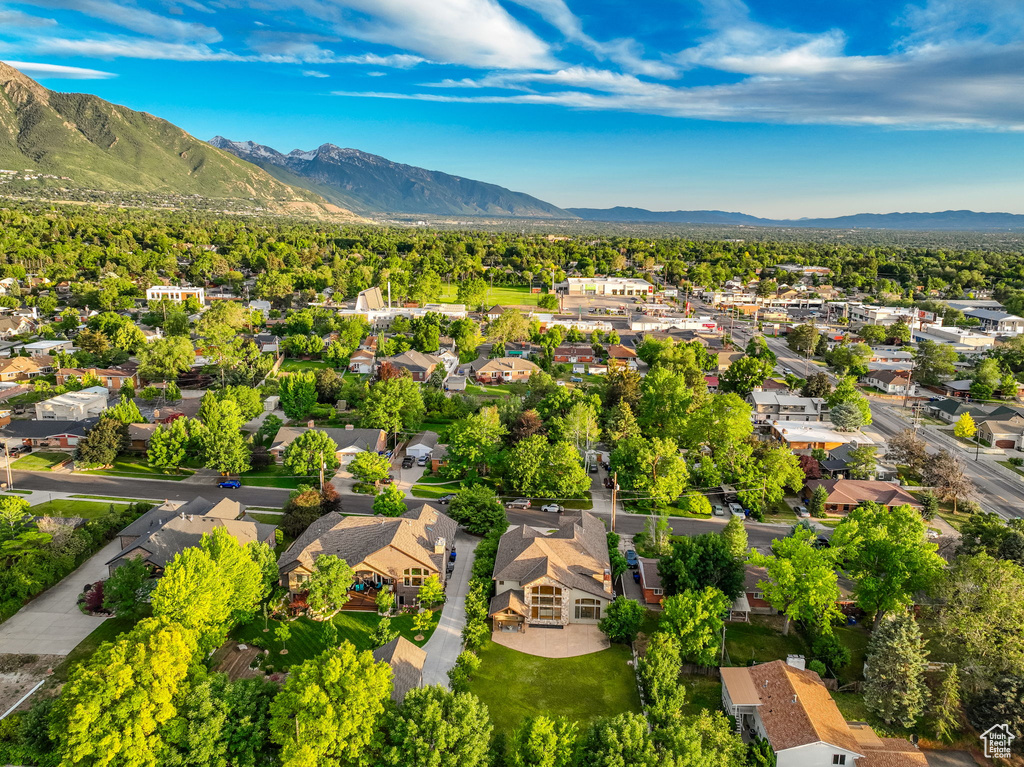 Aerial view of residential area with mountains