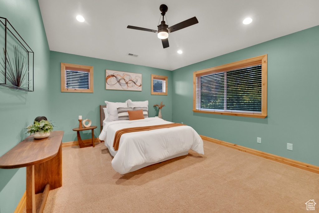 Bedroom featuring carpet, baseboards, recessed lighting, and a ceiling fan