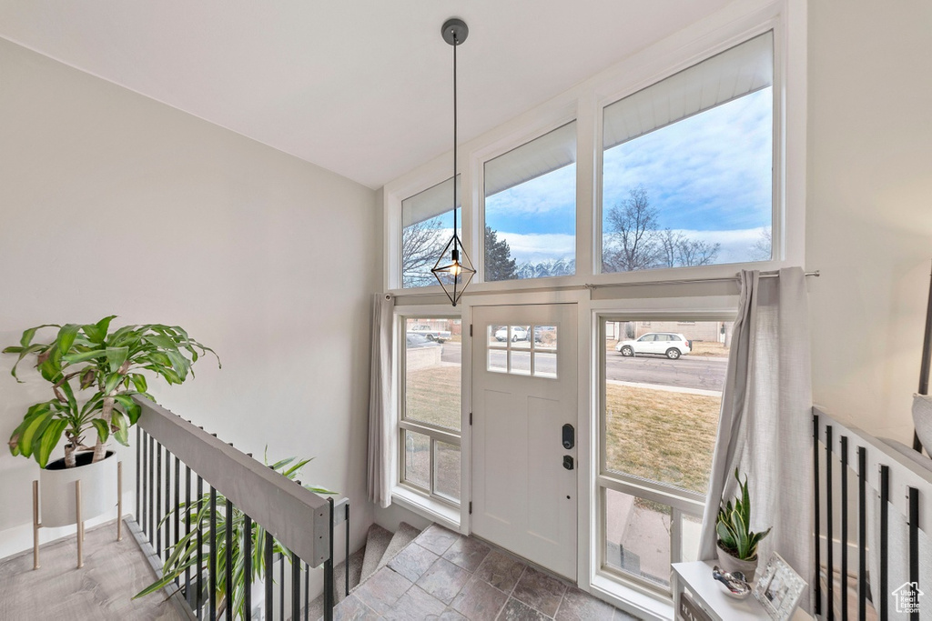 Foyer with stone finish floors