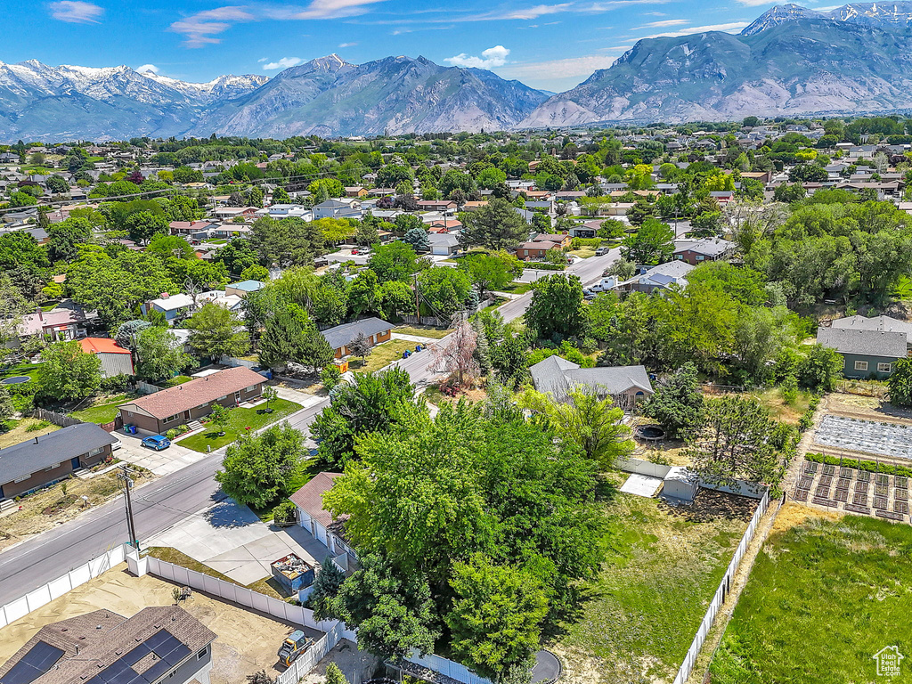 Aerial view of residential area with a mountainous background
