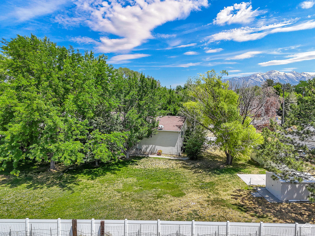 View of yard with a mountain view