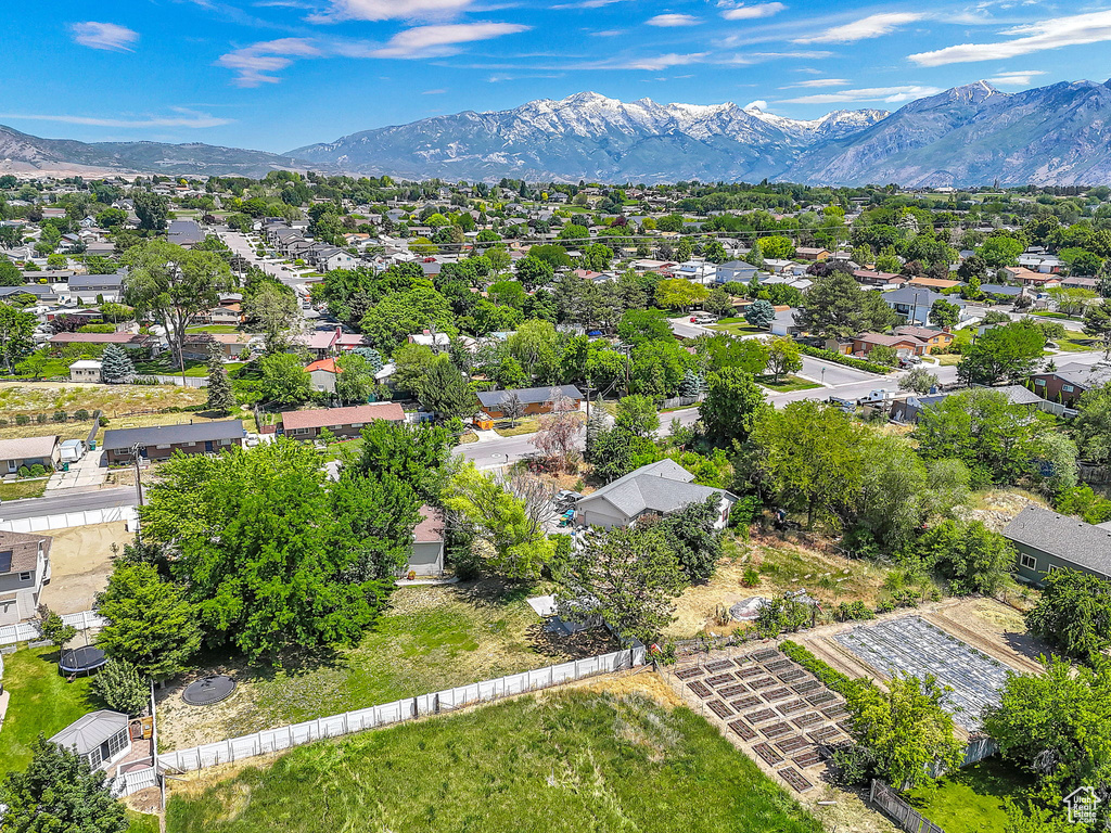 Aerial view of residential area with a mountainous background