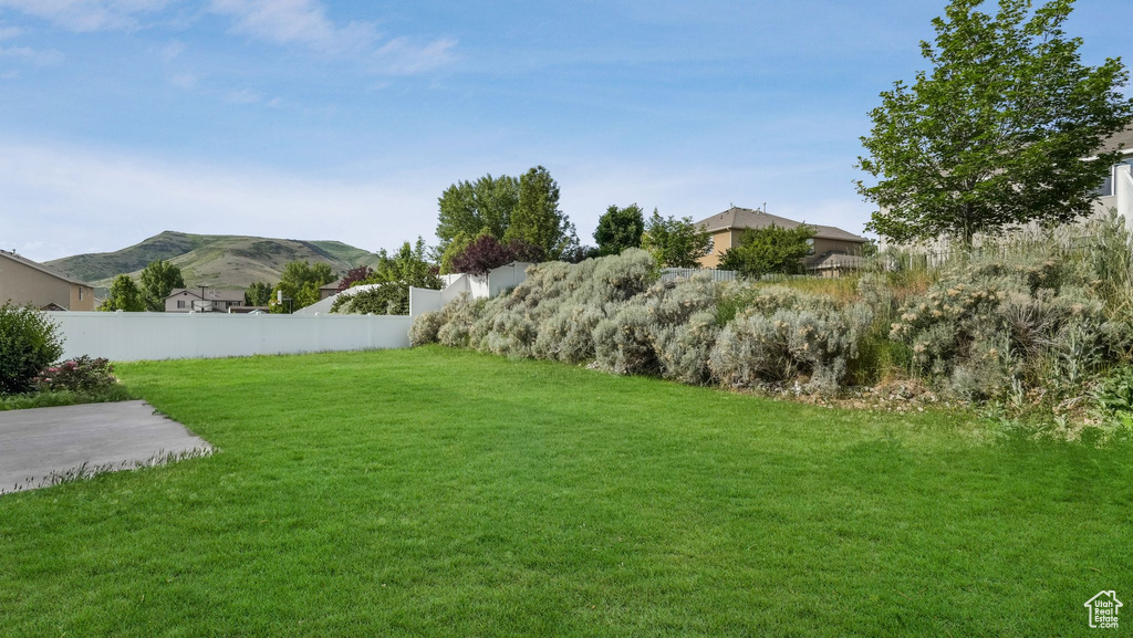 View of yard with a mountain view