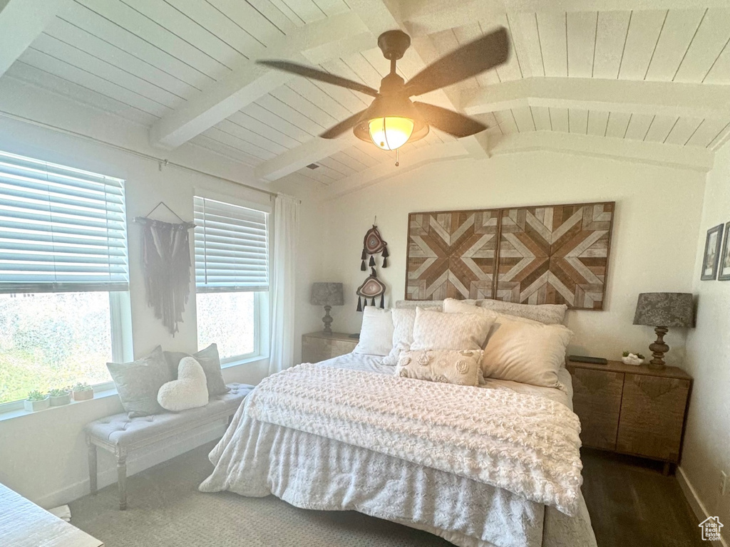 Bedroom featuring wooden ceiling, baseboards, and ceiling fan