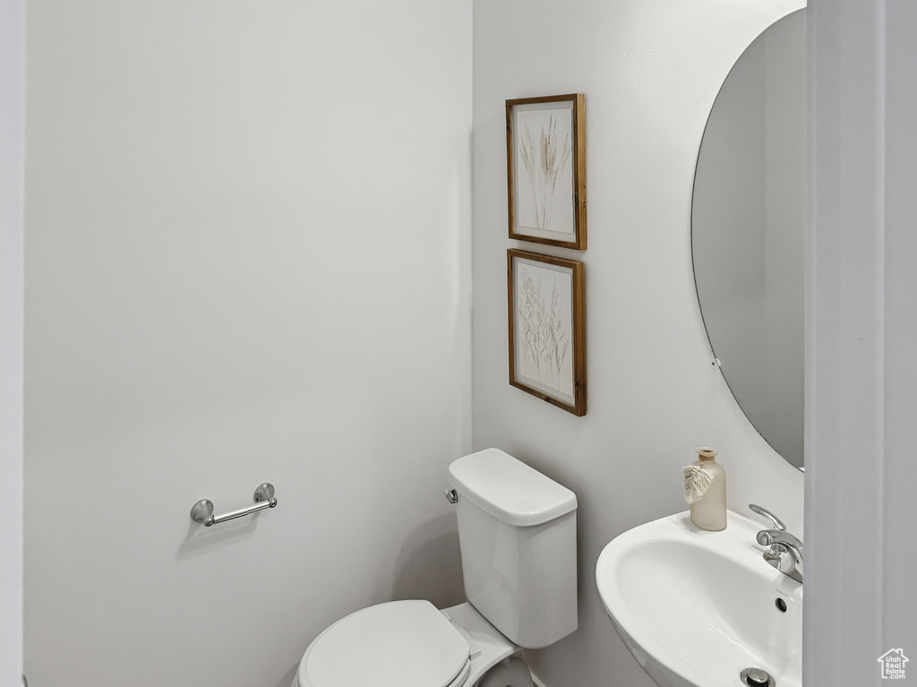 Bathroom with toilet and a sink