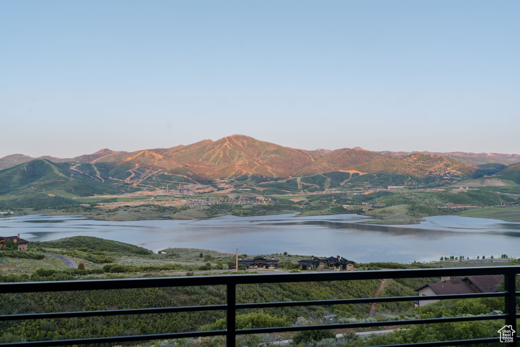 Mountain view featuring a nearby body of water