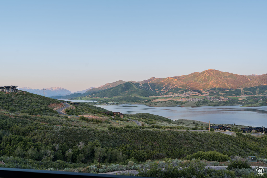 View of mountain backdrop with a nearby body of water