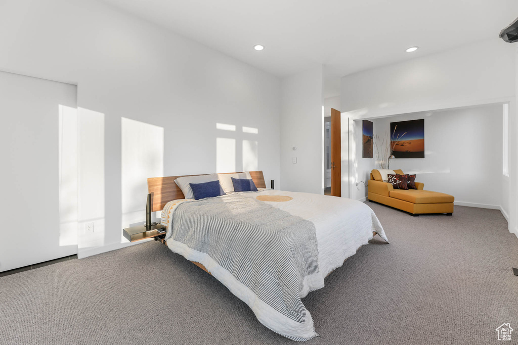 Bedroom featuring carpet flooring and recessed lighting