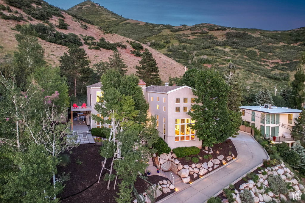 View from above of property with a mountainous background
