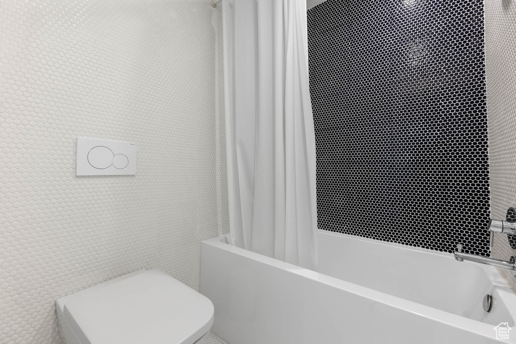 Bathroom with shower / tub combo