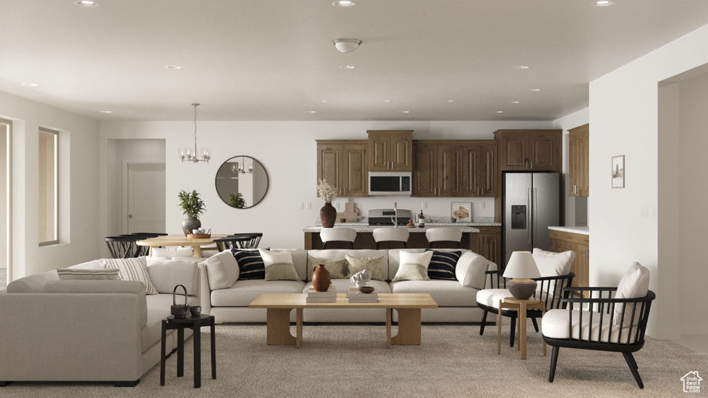 Living area featuring recessed lighting, a chandelier, and light colored carpet