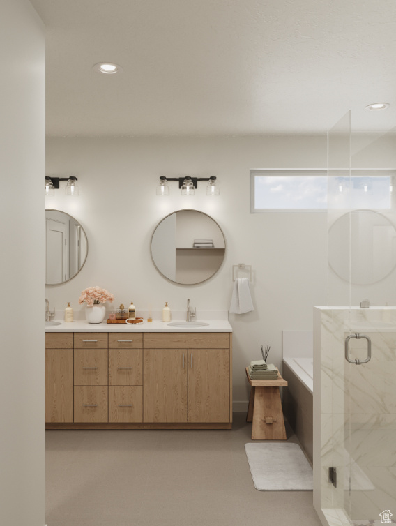 Bathroom featuring double vanity, a shower stall, a bath, and recessed lighting