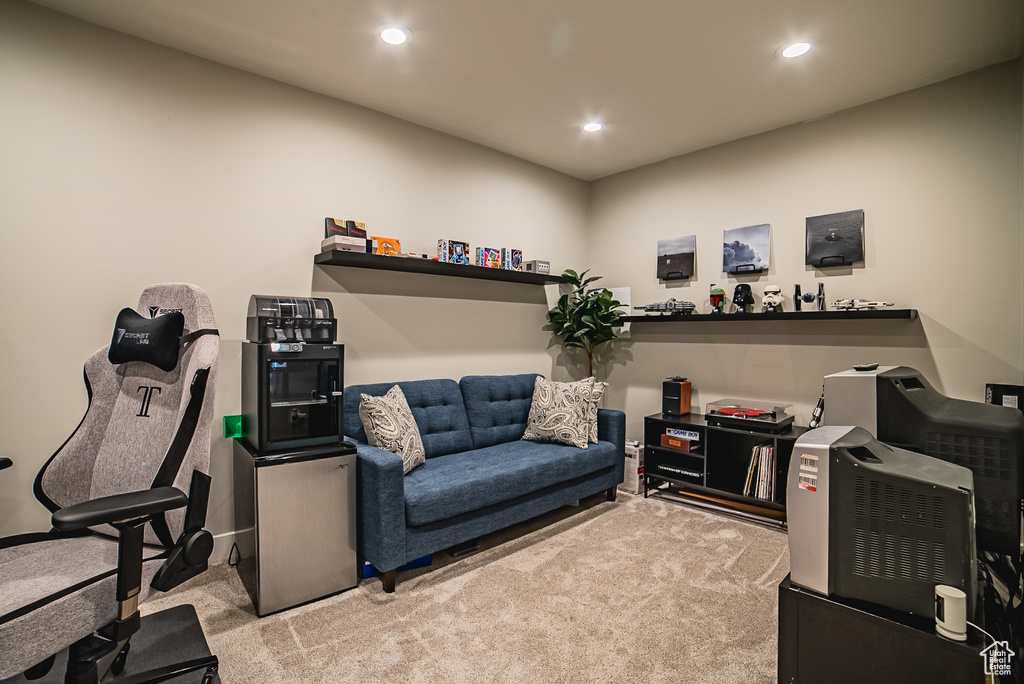 Office area with carpet floors and recessed lighting