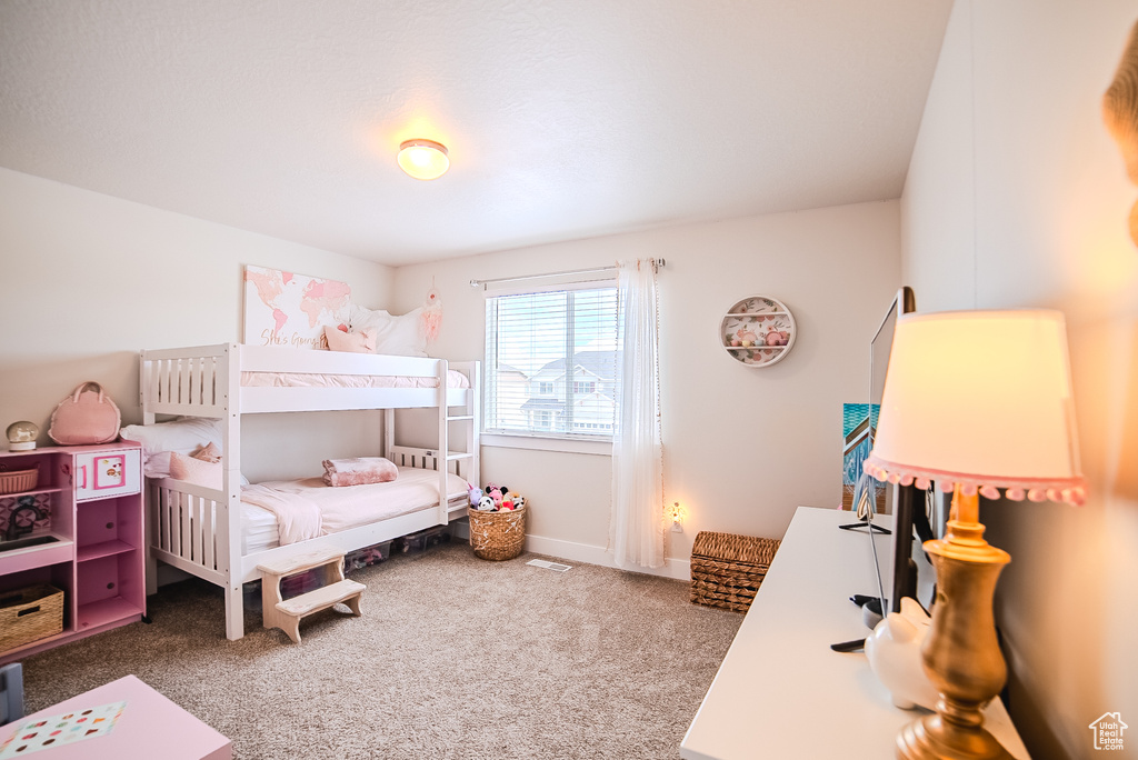 Bedroom featuring carpet floors