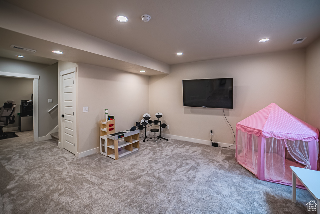 Game room with baseboards, carpet floors, and recessed lighting