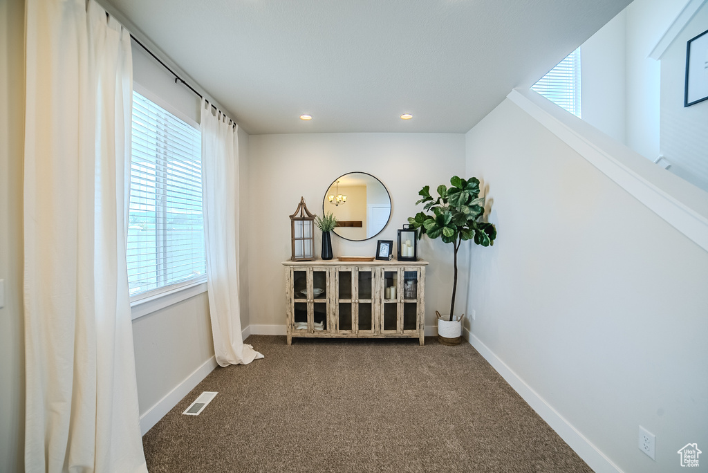 Corridor featuring carpet, recessed lighting, and baseboards