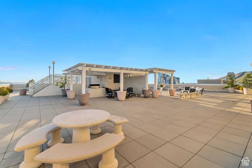 View of patio / terrace with a pergola and outdoor dining area