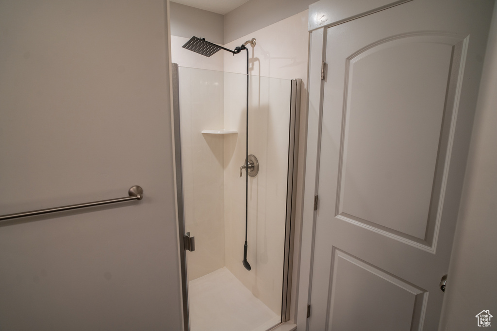Bathroom featuring a shower stall