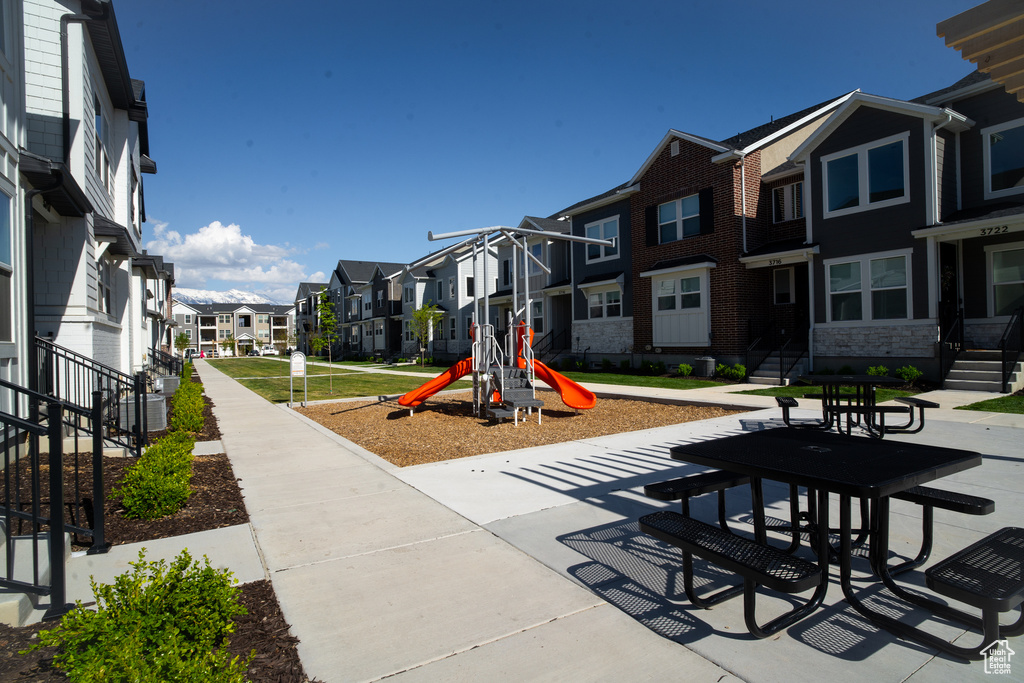 Communal playground featuring a residential view