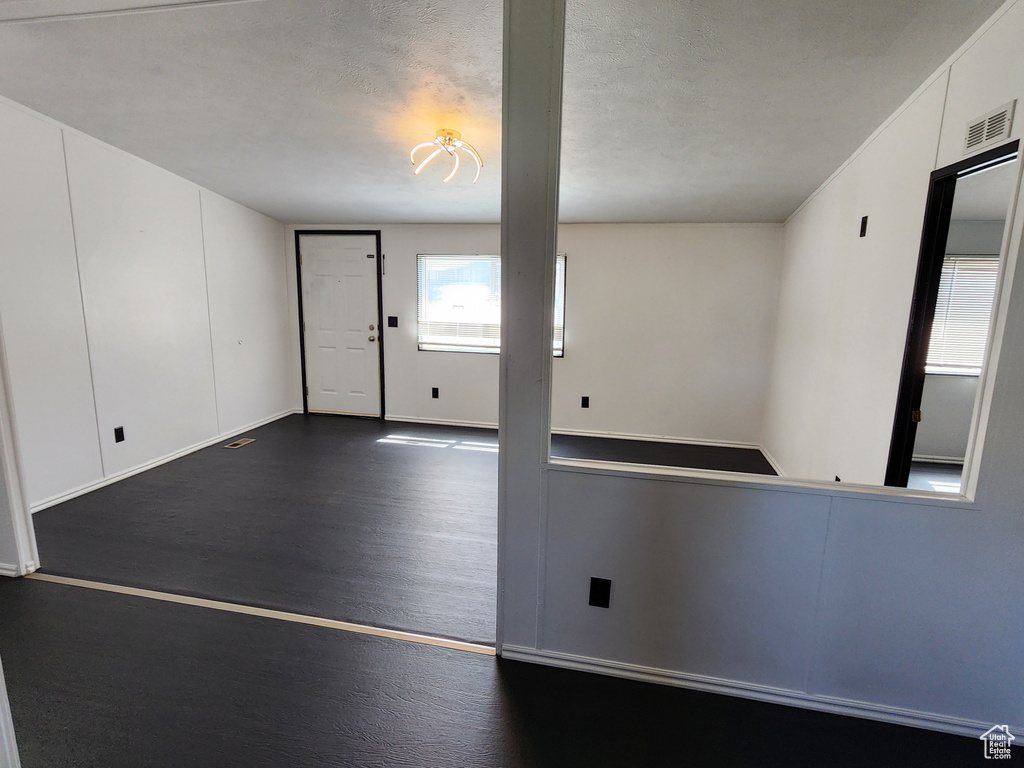 Empty room with baseboards