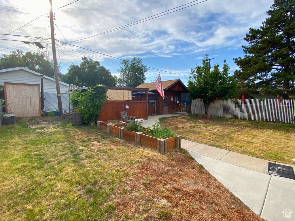View of yard with a garden