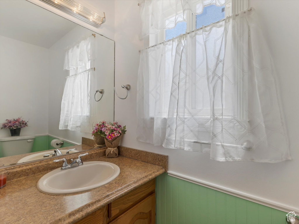Bathroom with vanity and toilet
