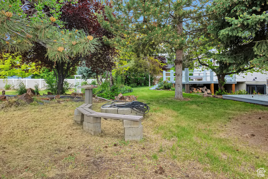 View of yard featuring a deck