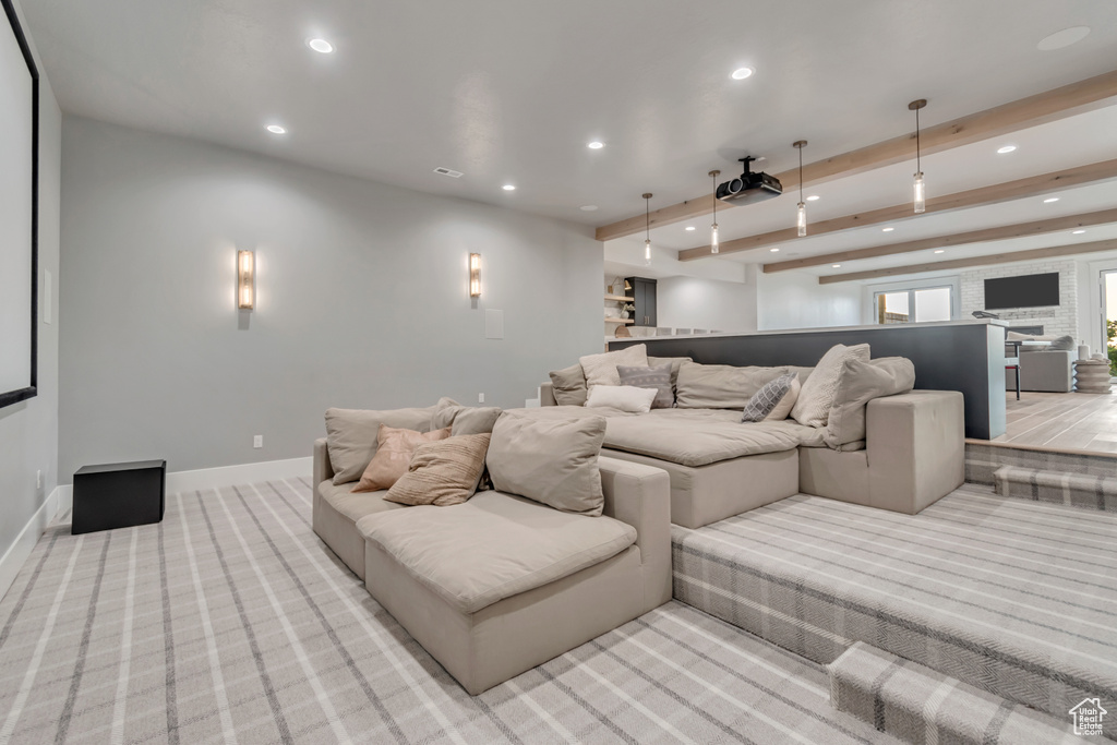 Cinema with recessed lighting, light colored carpet, baseboards, and beamed ceiling