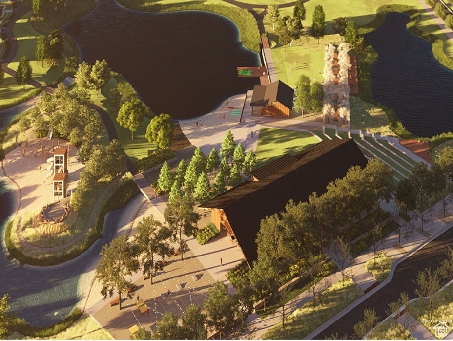Aerial view of property and surrounding area featuring a golf course