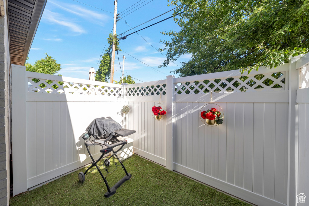 View of fenced backyard