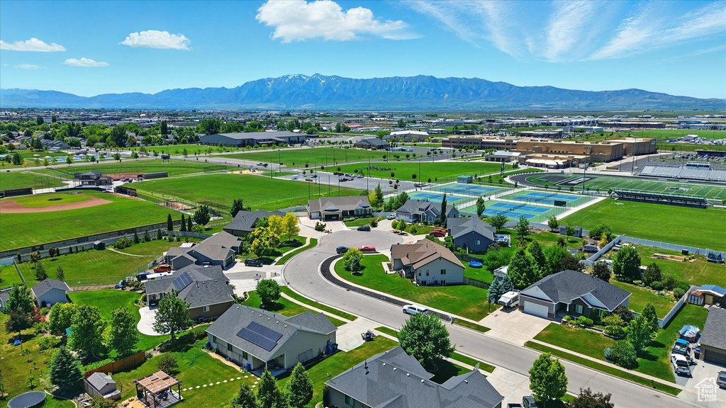 Aerial view of residential area with a mountain backdrop