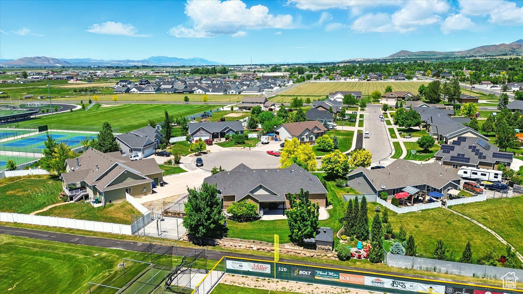 Aerial view of residential area featuring a mountain backdrop