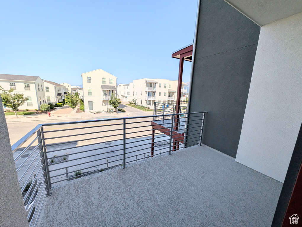 Balcony featuring a residential view