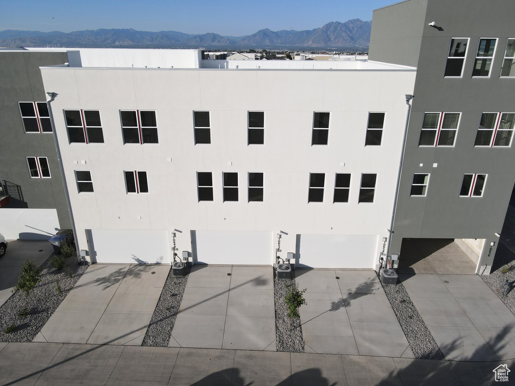 View of property with a mountain view