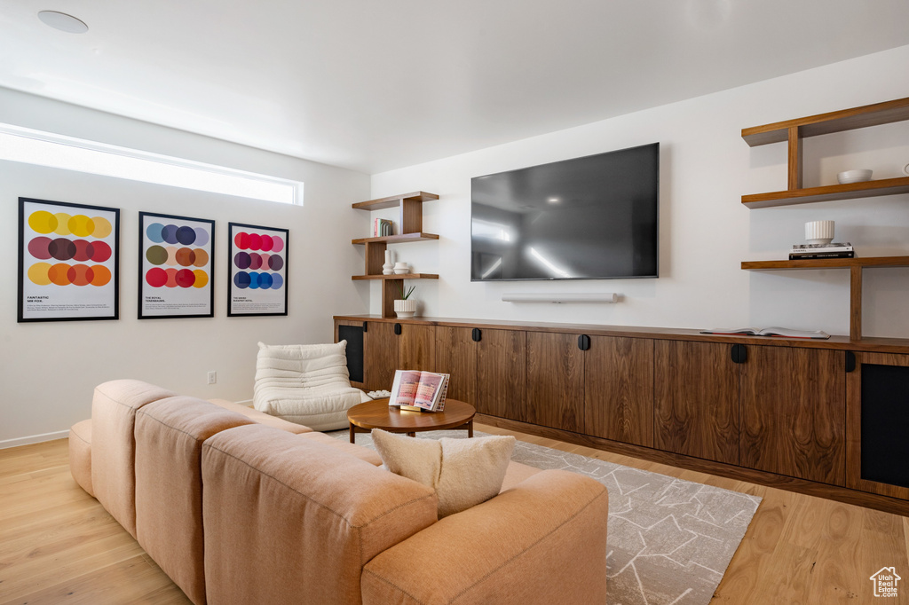 Living area with light wood-style flooring