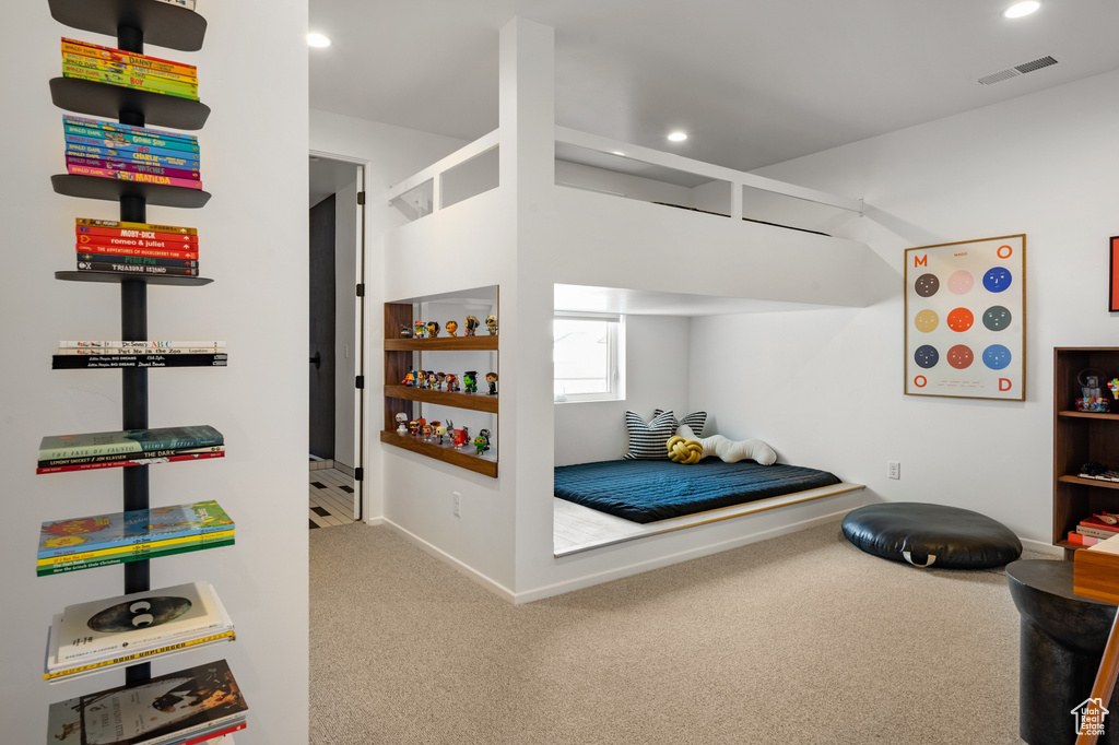 Bedroom with carpet floors, recessed lighting, and baseboards