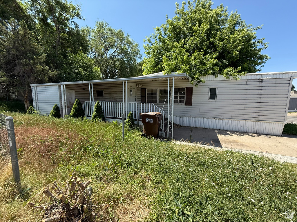 View of front of property featuring a porch
