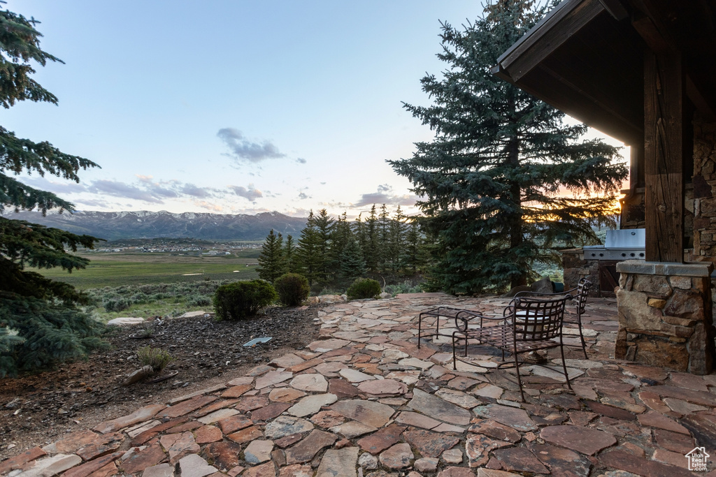 View of patio / terrace with a mountain view