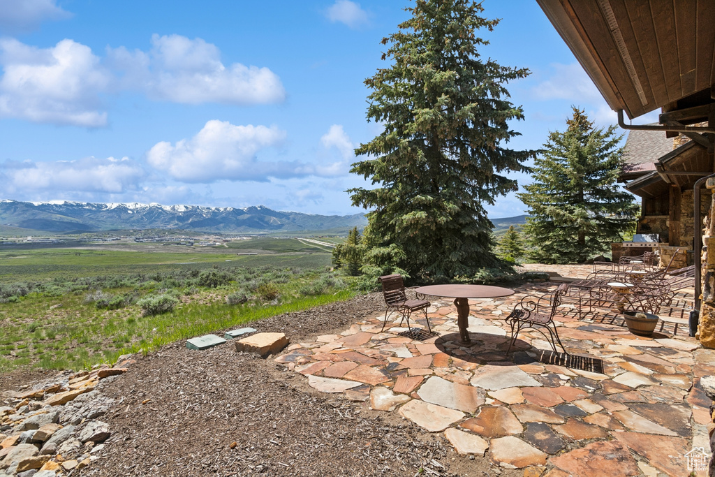 View of patio / terrace with a mountain view